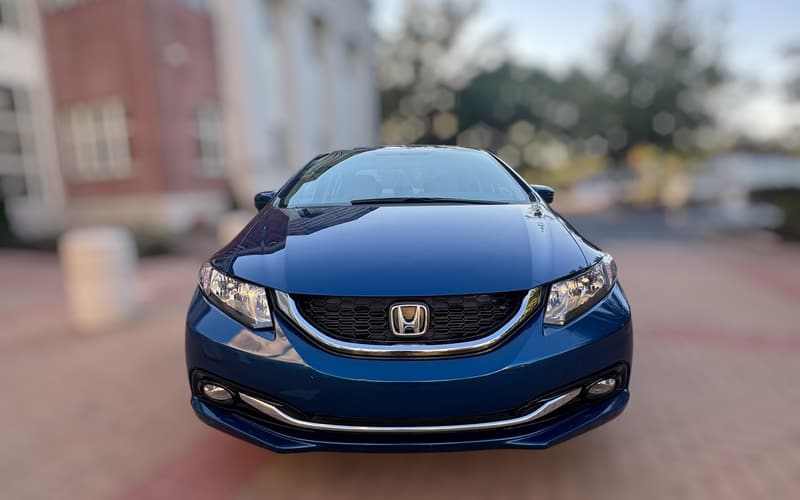 2015 Honda Civic front view with fog lights and chrome grille