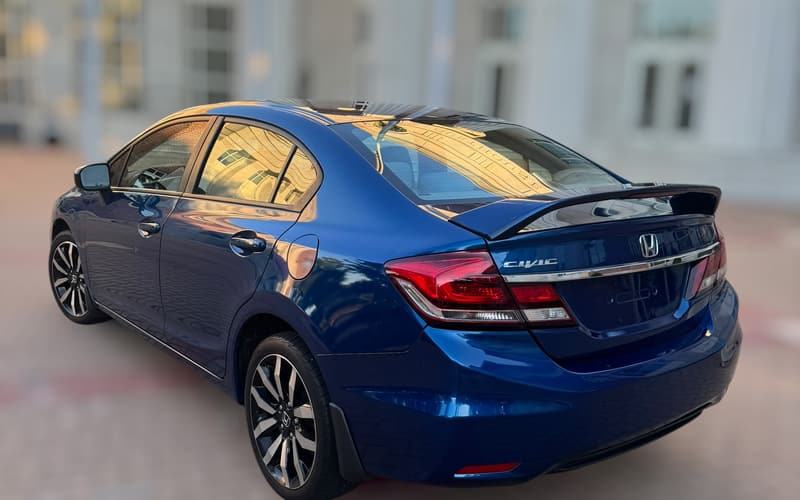 2015 Honda Civic rear view showing the tail lights and spoiler